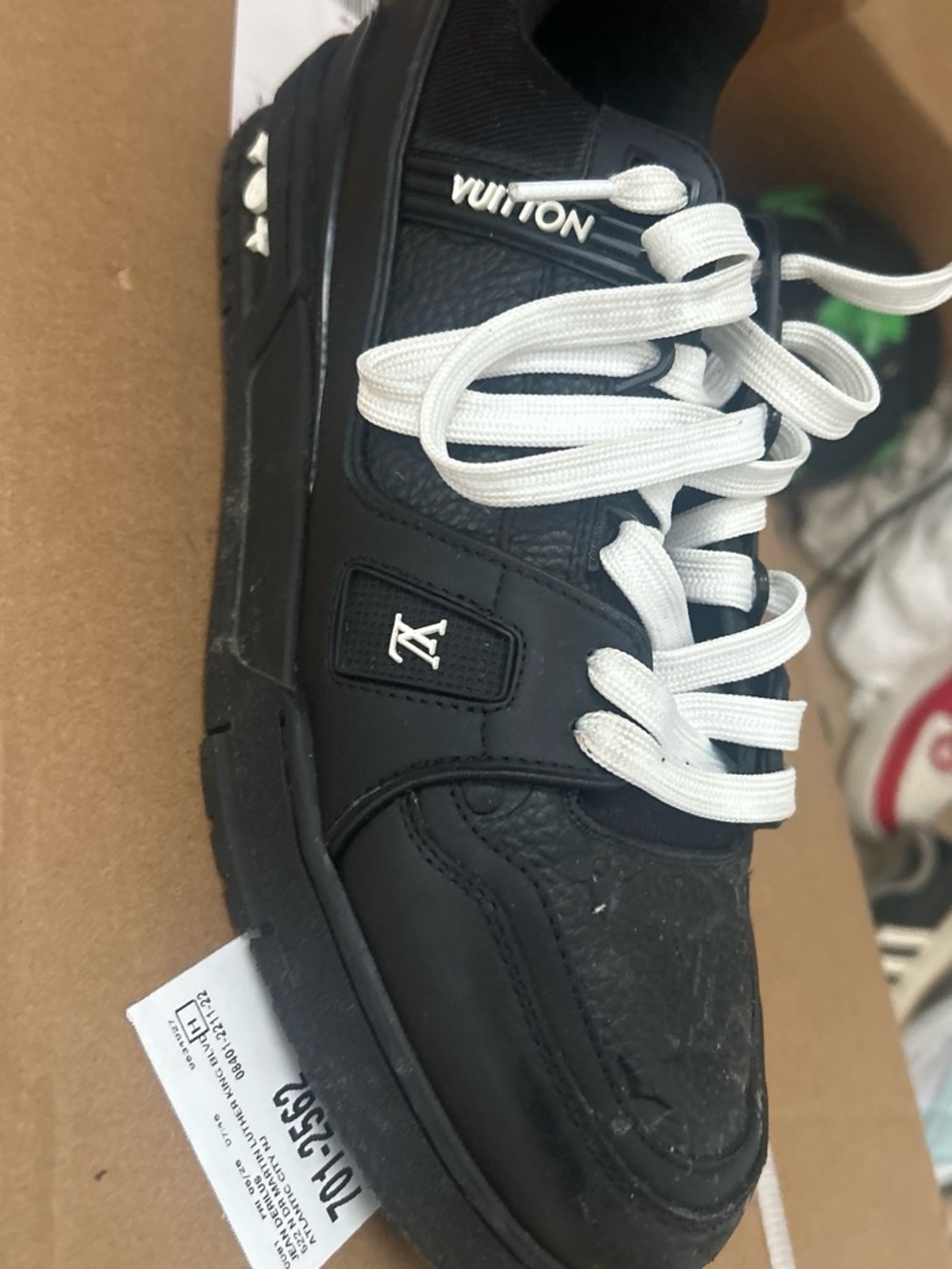 Louis Vuitton Black and White Leather Low-Top Sneaker